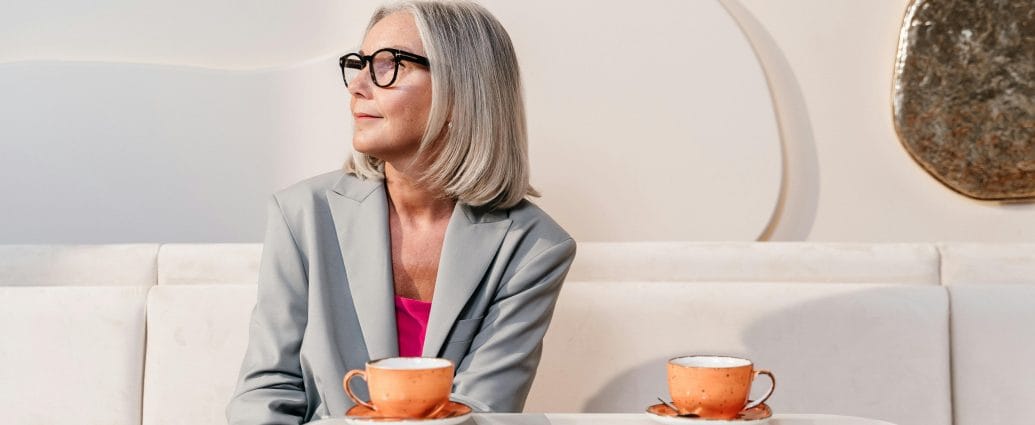 Emotional tensions in the family reflected in a woman sitting alone at a table
