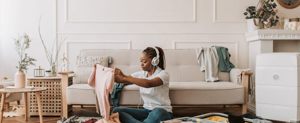 Woman creating an organized home after a major life change