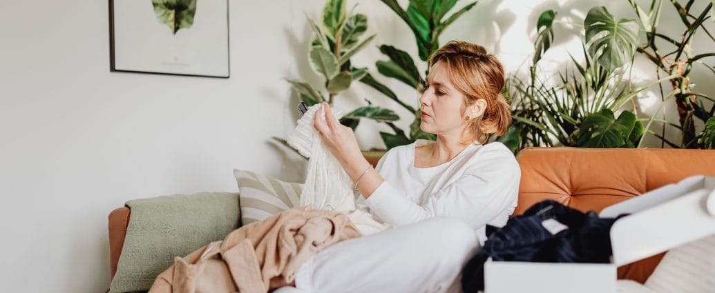 Woman decluttering her home by organizing everyday items using simple practical routines