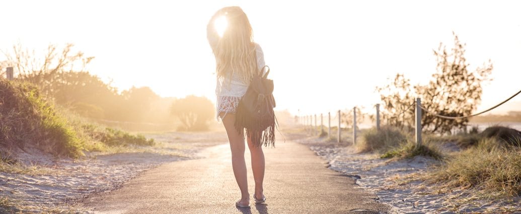 Woman moving forward and realizing her life is not behind